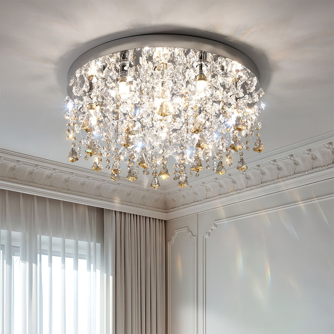Glass flush mount ceiling light with shimmering crystal drops in a classic room with ornate molding.