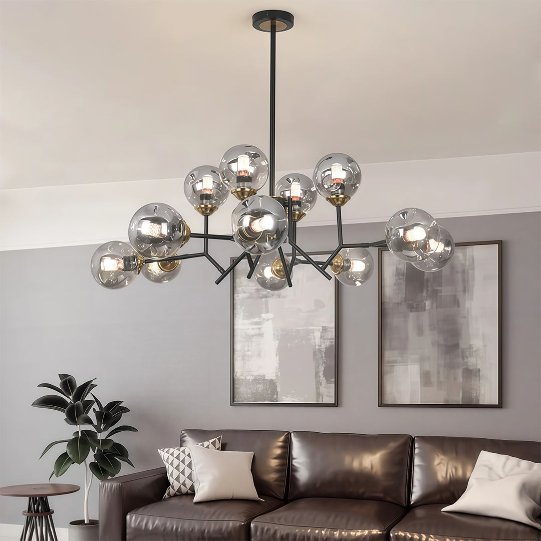 Glass globe chandelier in a cozy living room, enhancing the ambiance with warm and inviting illumination.