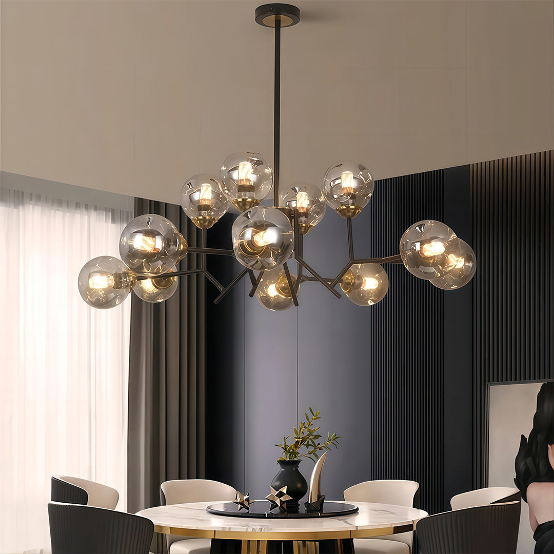 Glass globe chandelier hanging above a dining table, adding a touch of sophistication to the dining area.