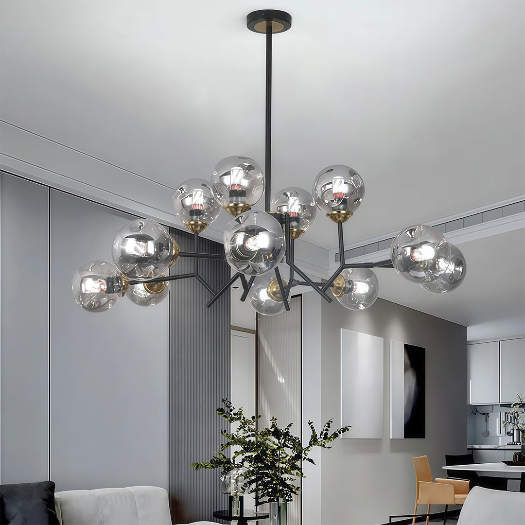 A glass globe chandelier introduces soft curves into a modern living room.