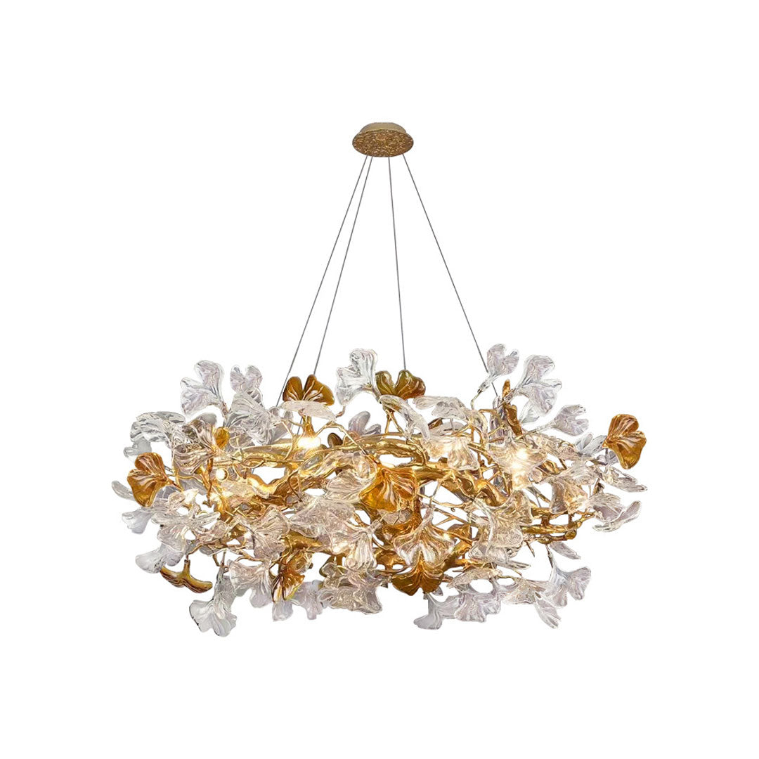 Glass leaf chandelier with cascading clear glass leaves and warm amber decorative accents.