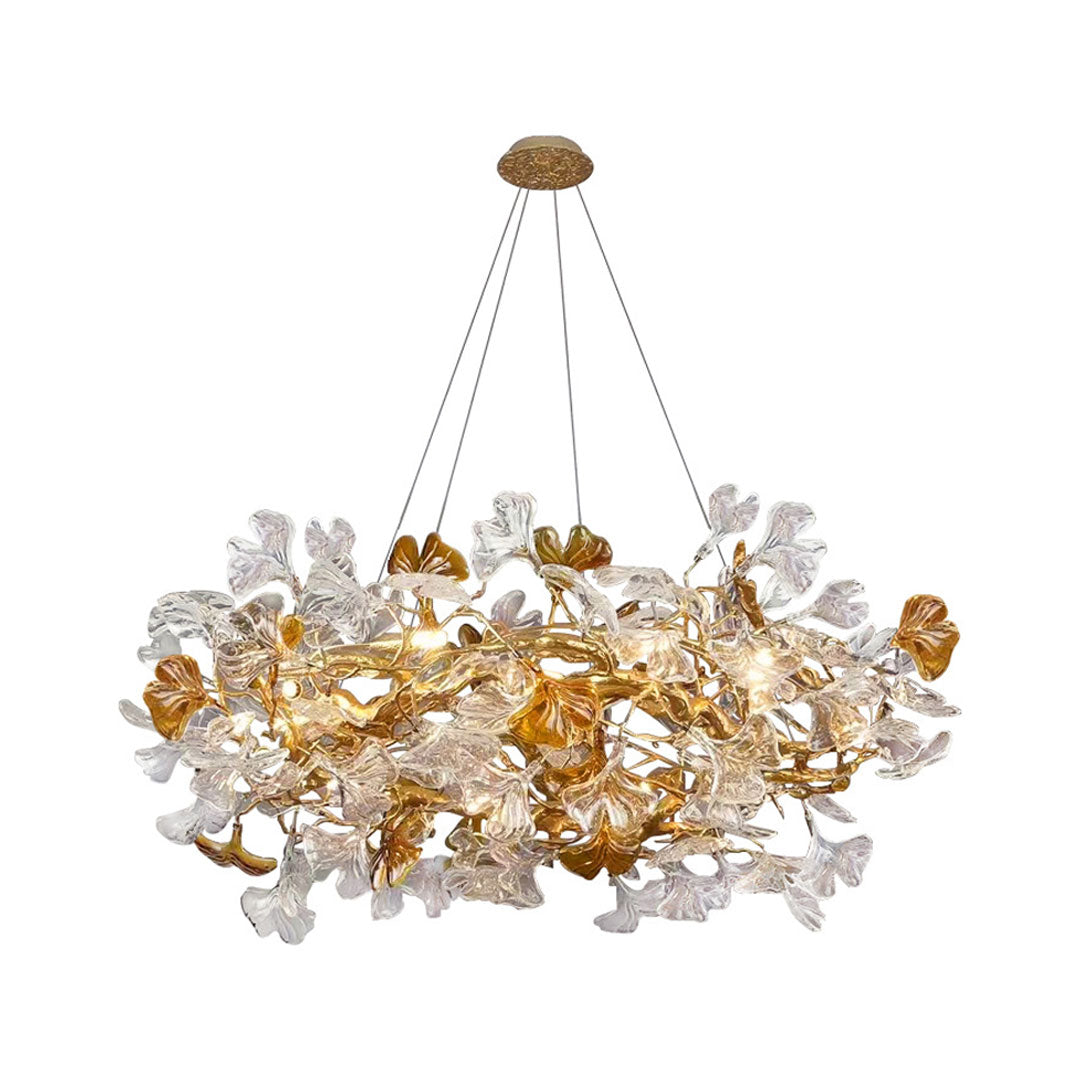 Glass leaf chandelier featuring a wide circular design with layered glass foliage and warm lighting.