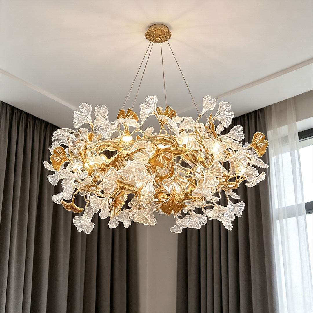 Glass leaf chandelier installed in an elegant interior with sparkling clear and amber glass details.