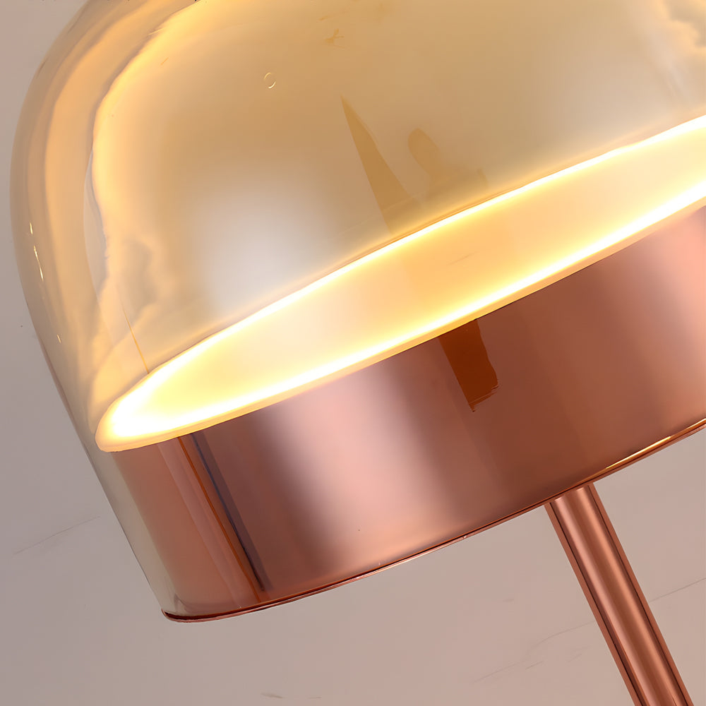 Glass mushroom table lamp with a warm glow, enhancing the ambiance of a contemporary room.