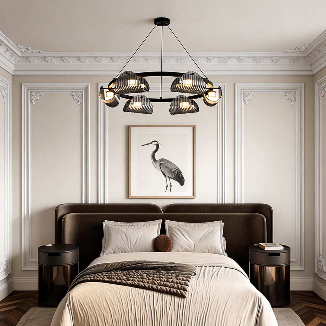 Glass ring chandelier hanging above a modern bedroom with a stylish and elegant design.