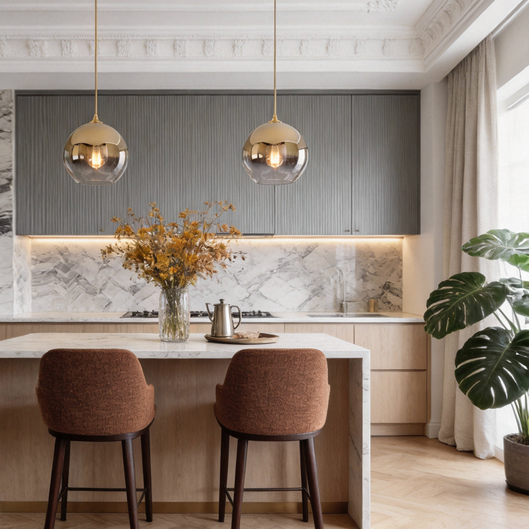 Glass round pendant light hanging over a dining table in a contemporary dining room.