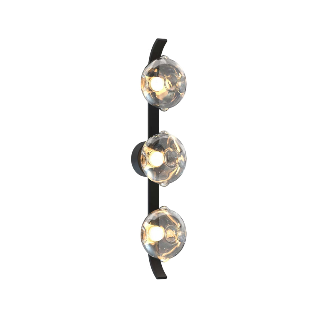 Multiple design variations of glass wall sconces in black and gold finishes.