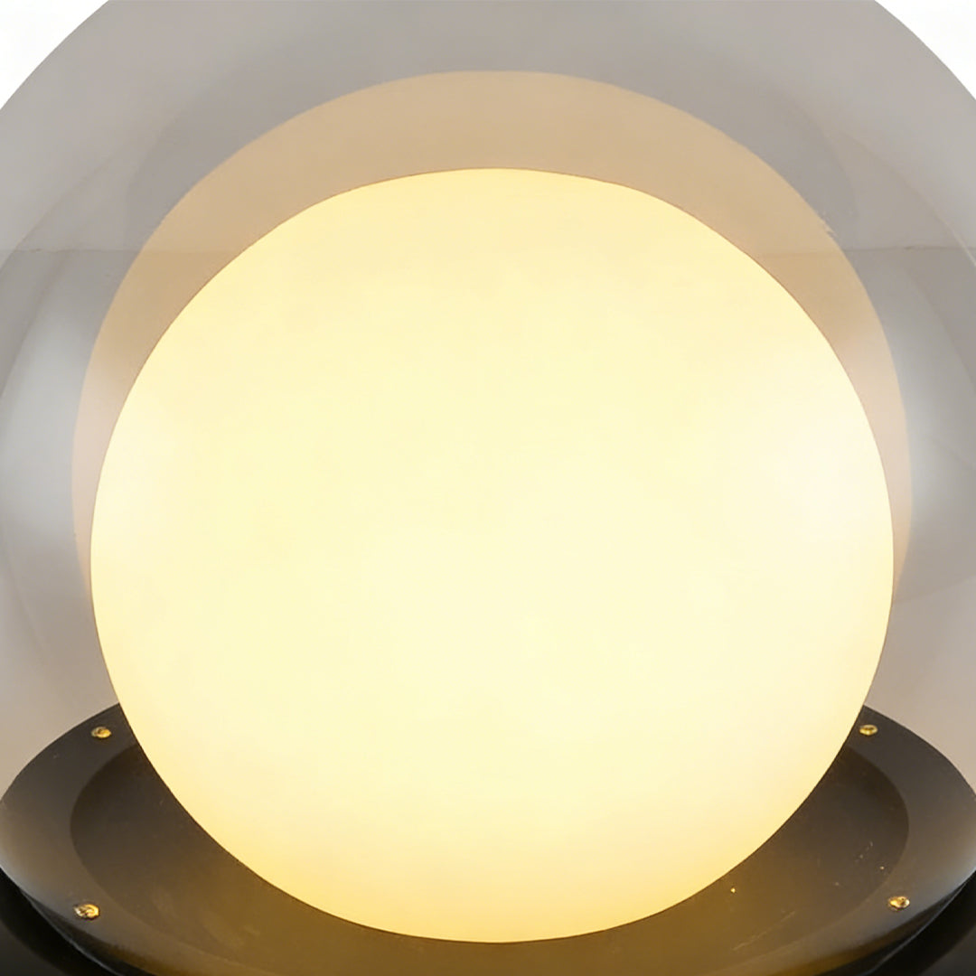 Global pillar lights with a sleek design, enhancing a contemporary outdoor space.