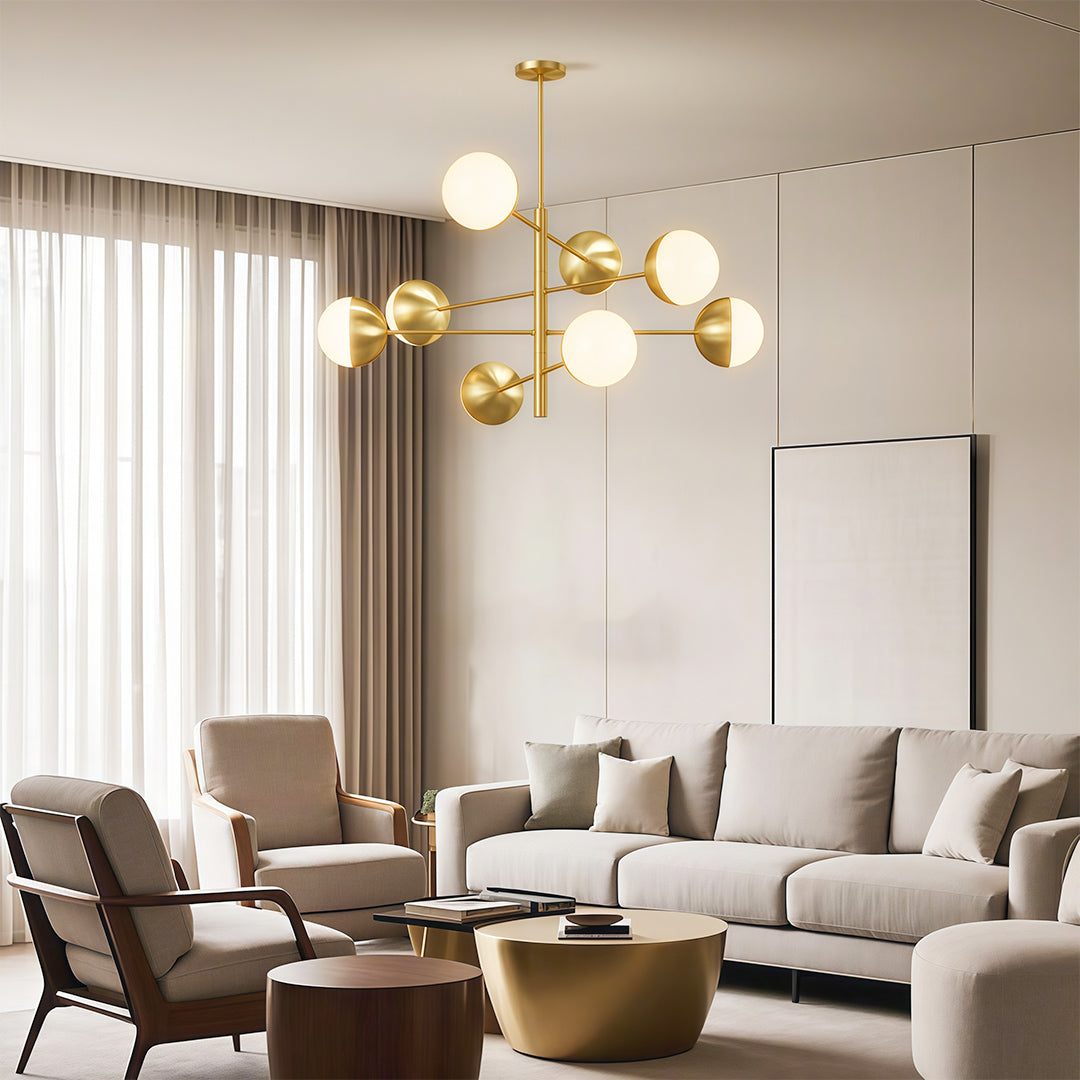 Modern luxury chandeliers enhancing elegant living room with curved sofa and neutral palette