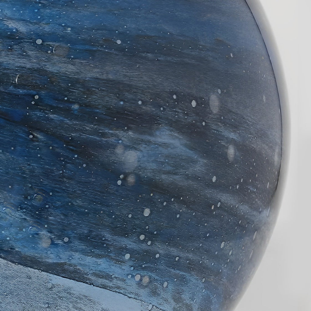 Globe pillar lights casting ambient glow on outdoor terrace.