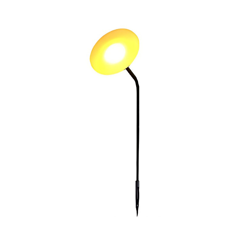 Glowing mushroom garden light with a close-up of the illuminated mushroom cap.