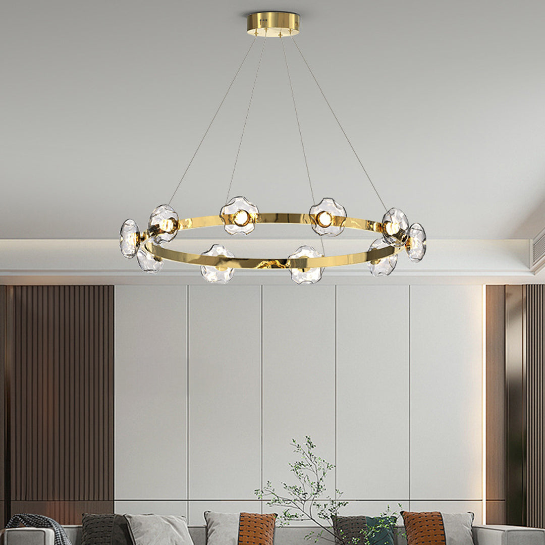 Sophisticated 6 light pendant with gold accents enhancing luxury dining room with circular glass arrangement