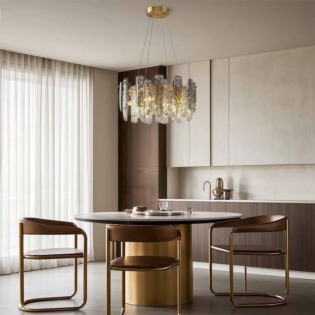 Luxury contemporary crystal chandeliers with gold brass finish and layered smoked crystal glass.
