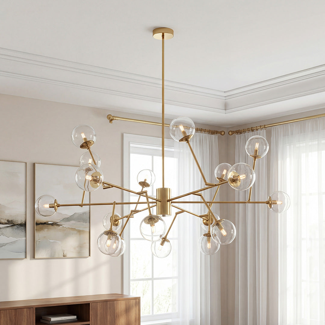 Striking gold bubble sputnik chandelier featuring branching arms and clear glass globes illuminating a modern elegant room.