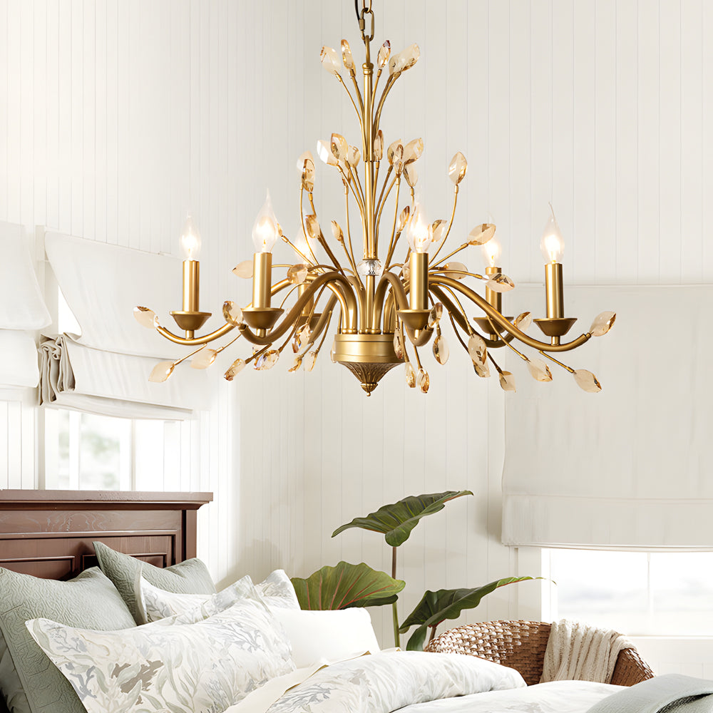 Gold candlestick chandelier with a vintage design, providing warm light in a stylish living room.