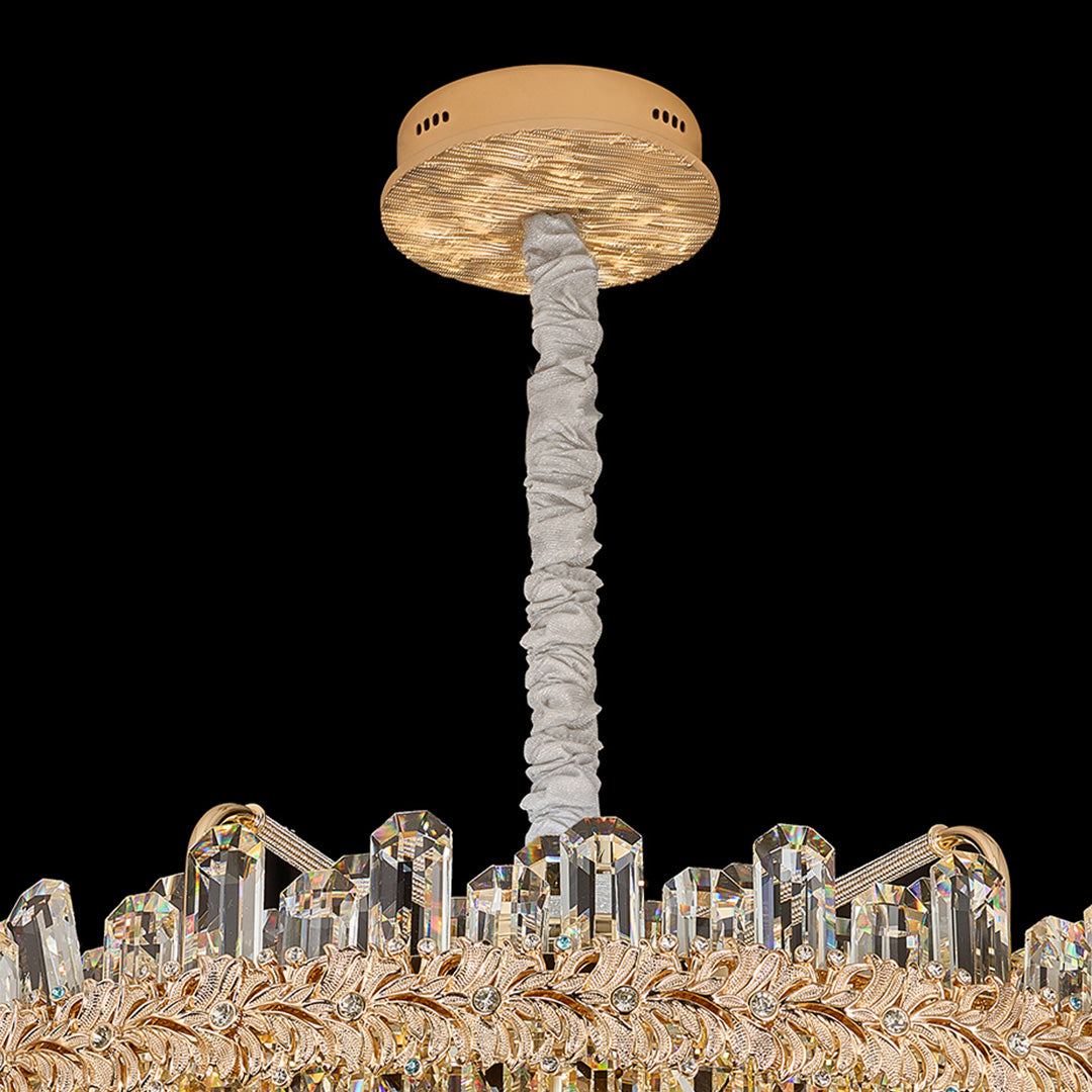 Ceiling-mounted gold chandelier lamp with clear crystal details.