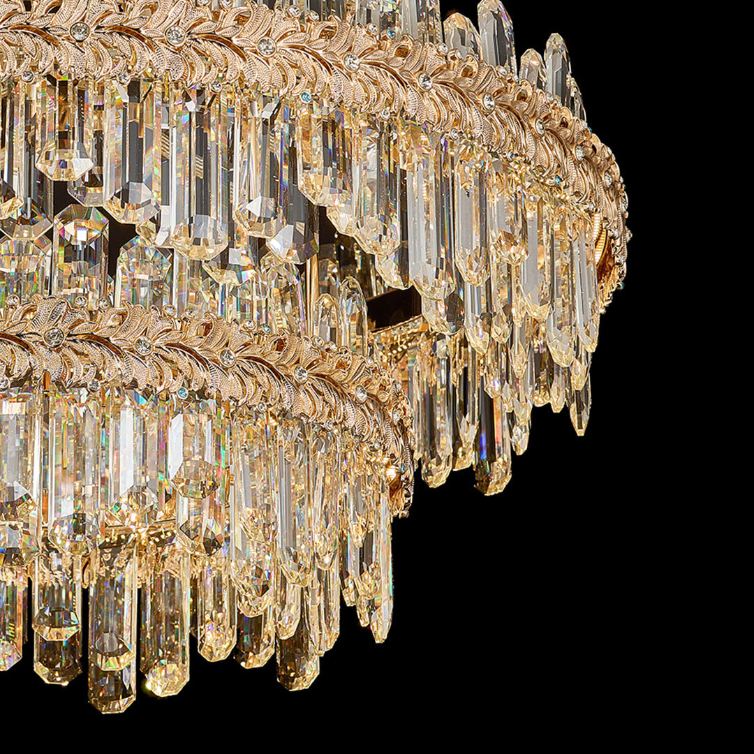Ceiling-mounted gold chandelier lamps crystal with clear crystal details.