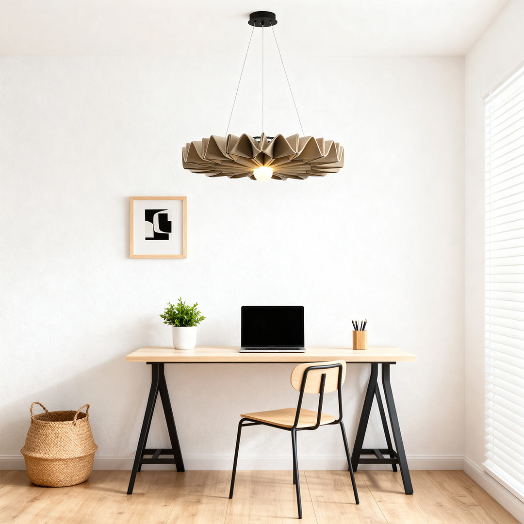 Unique gold cloth chandelier lighting a modern minimalist home office desk setup 