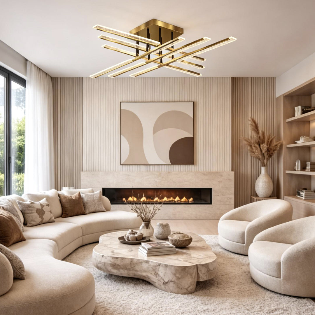 Gold cross ceiling light installed in a modern living room with neutral furniture.