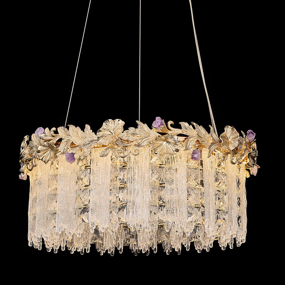 Black background showcasing gold crystal chandelier with sparkling detail.
