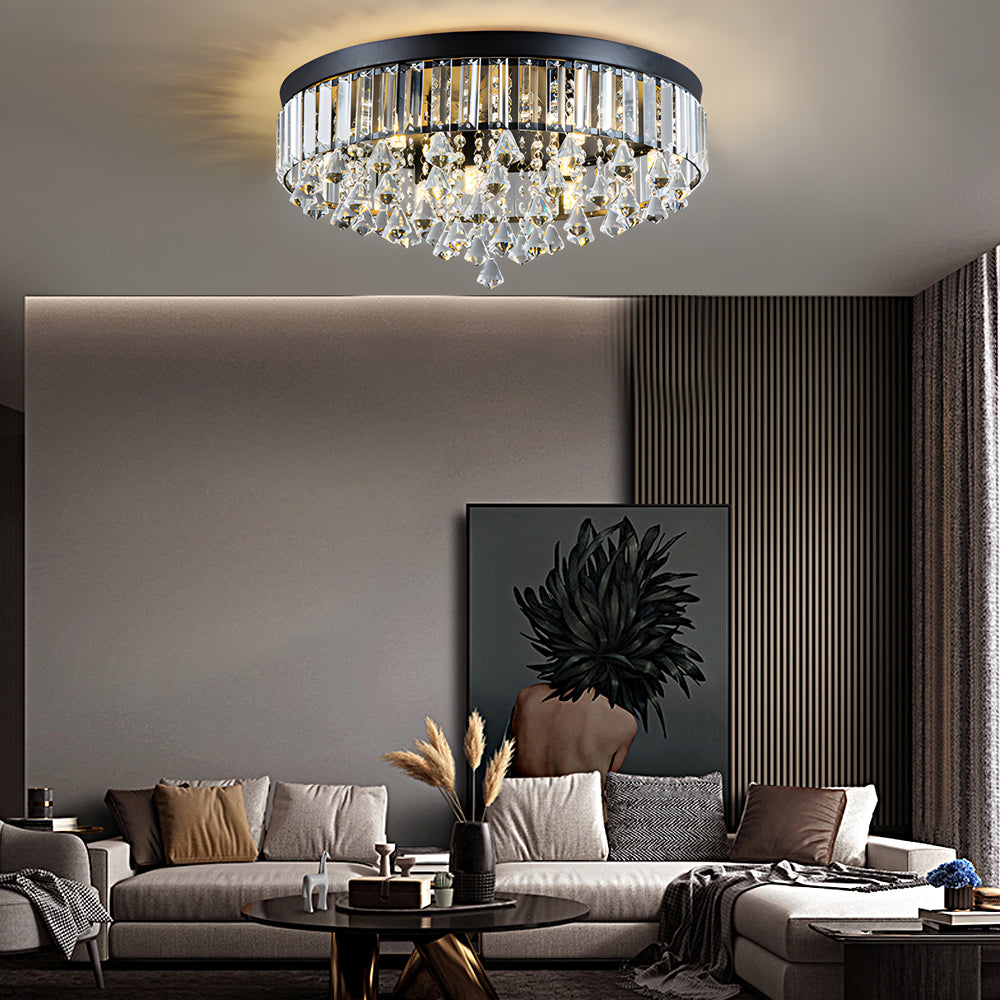 Gold crystal flush mount light with intricate crystal details, illuminating a cozy bedroom.