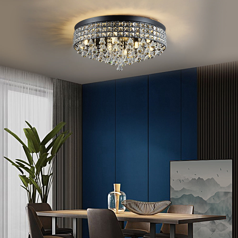 Gold crystal flush mount light with a luxurious design, enhancing a modern living room.