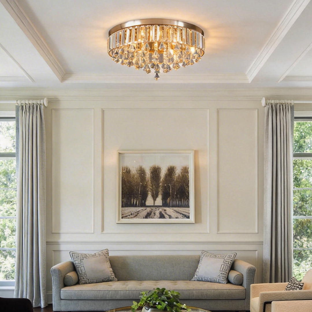 Gold crystal flush mount light illuminating a modern living room with elegant crystal details.