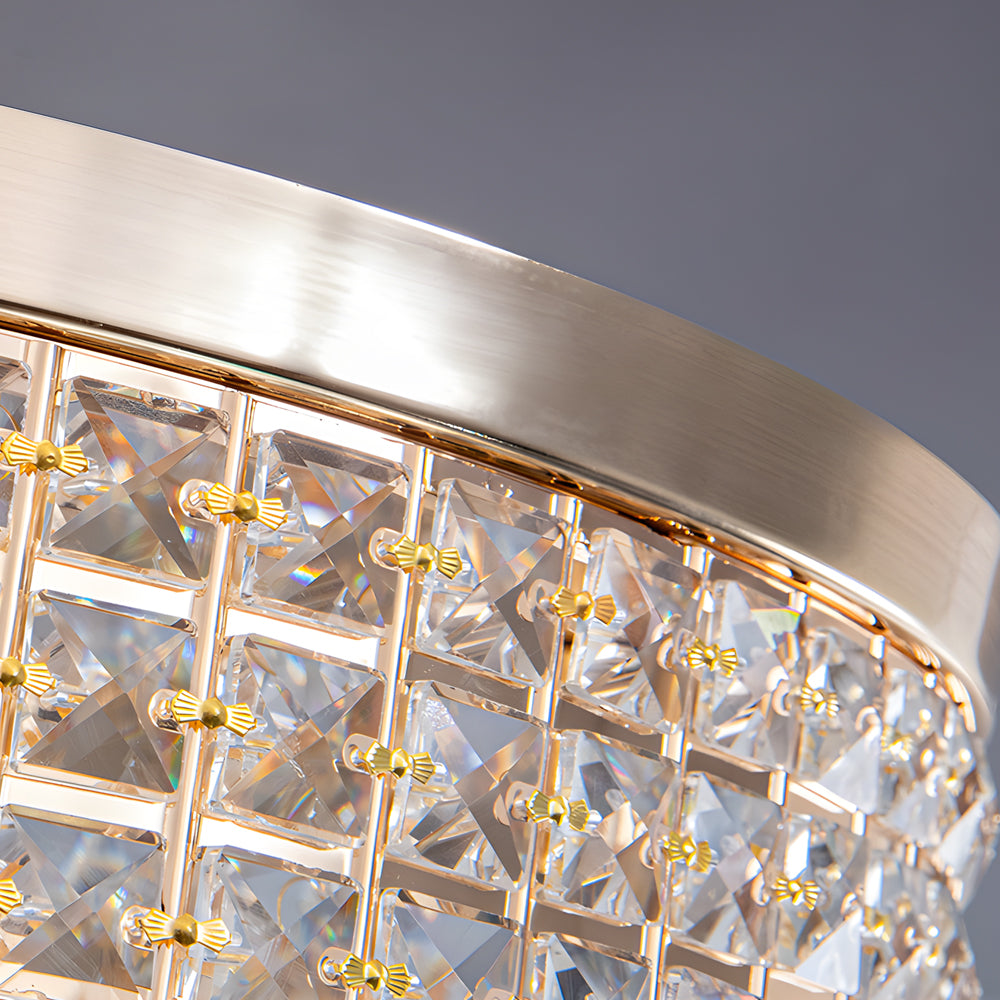 Gold crystal flush mount light with a modern design, providing soft illumination.