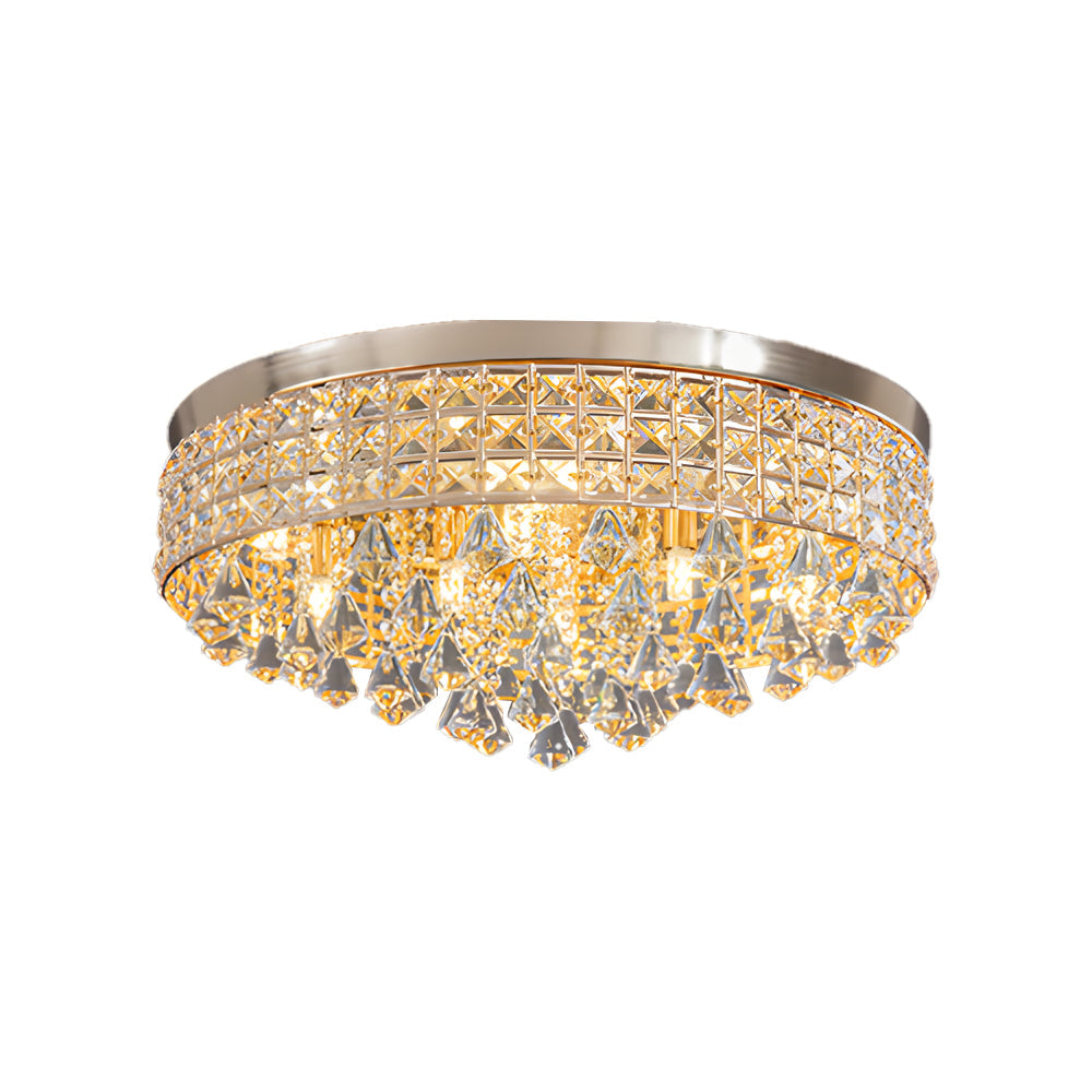 Gold crystal flush mount light with a sleek design, illuminating a modern bedroom.