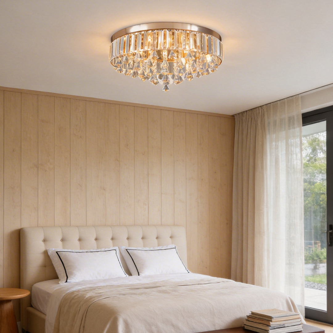 Gold crystal flush mount light with sparkling crystals, enhancing a contemporary bedroom.