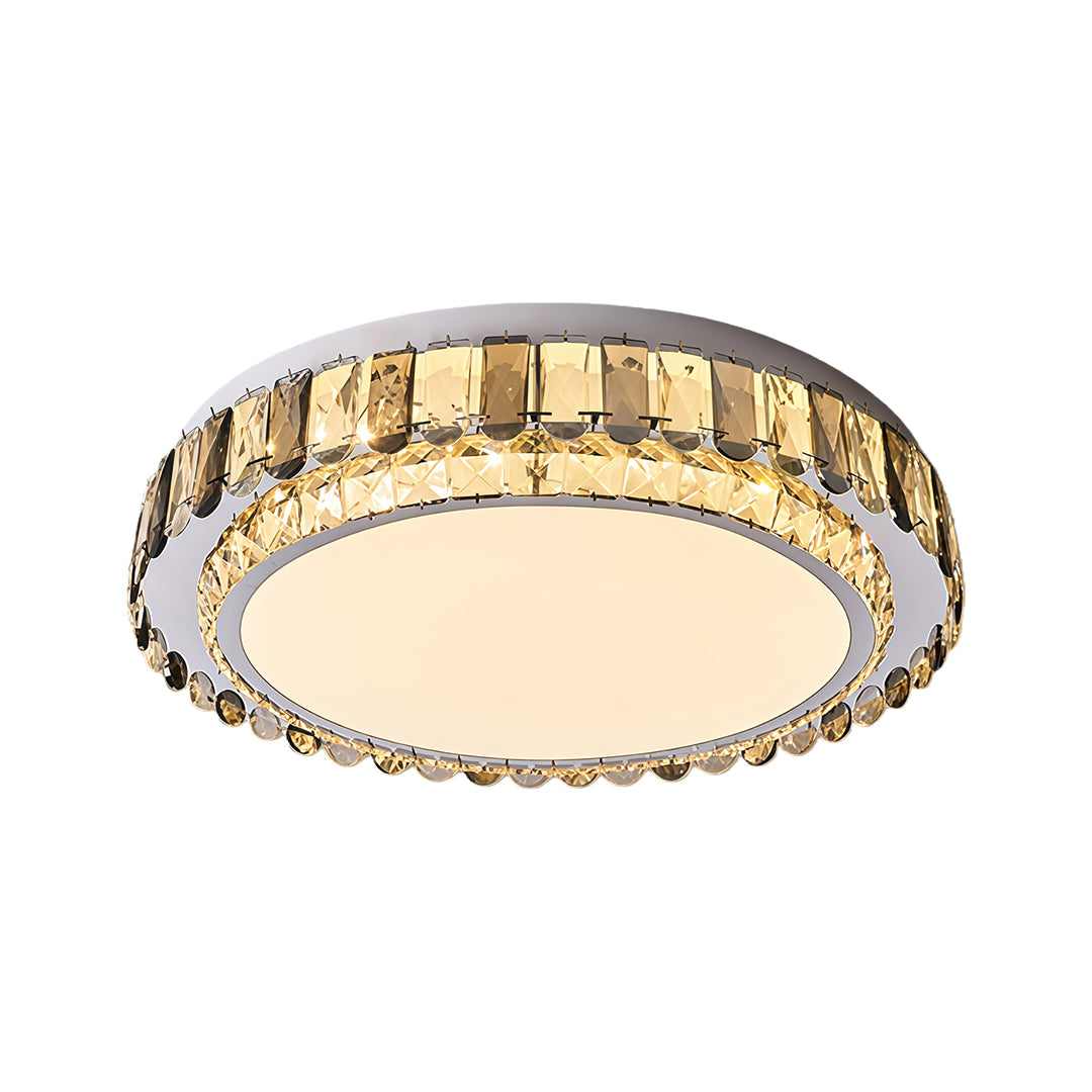 LED light fixture flush mount with gold rim and clear crystal edge.