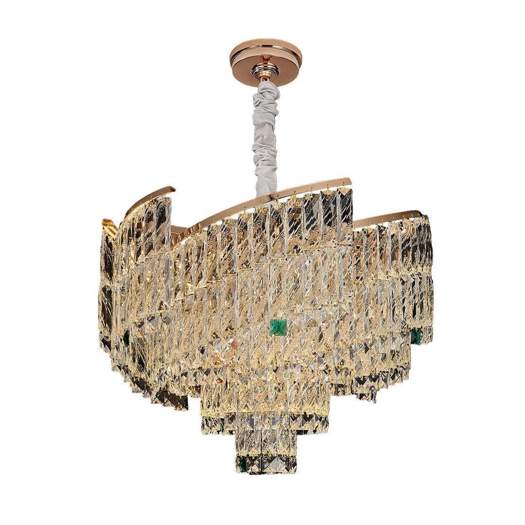 Gold crystal pendant chandelier with layered prisms and green crystal accents.