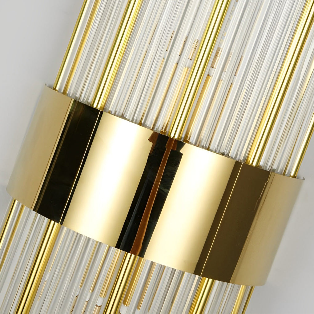 Gold and crystal wall sconces with a modern design, enhancing a luxurious living room.