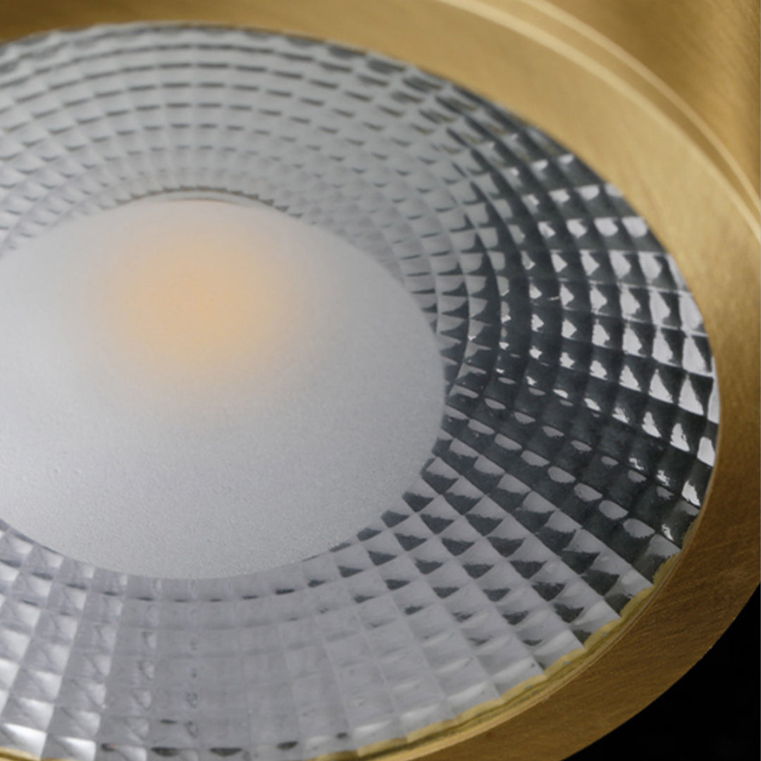 Gold downlight reflector detail showing anti-glare textured interior.