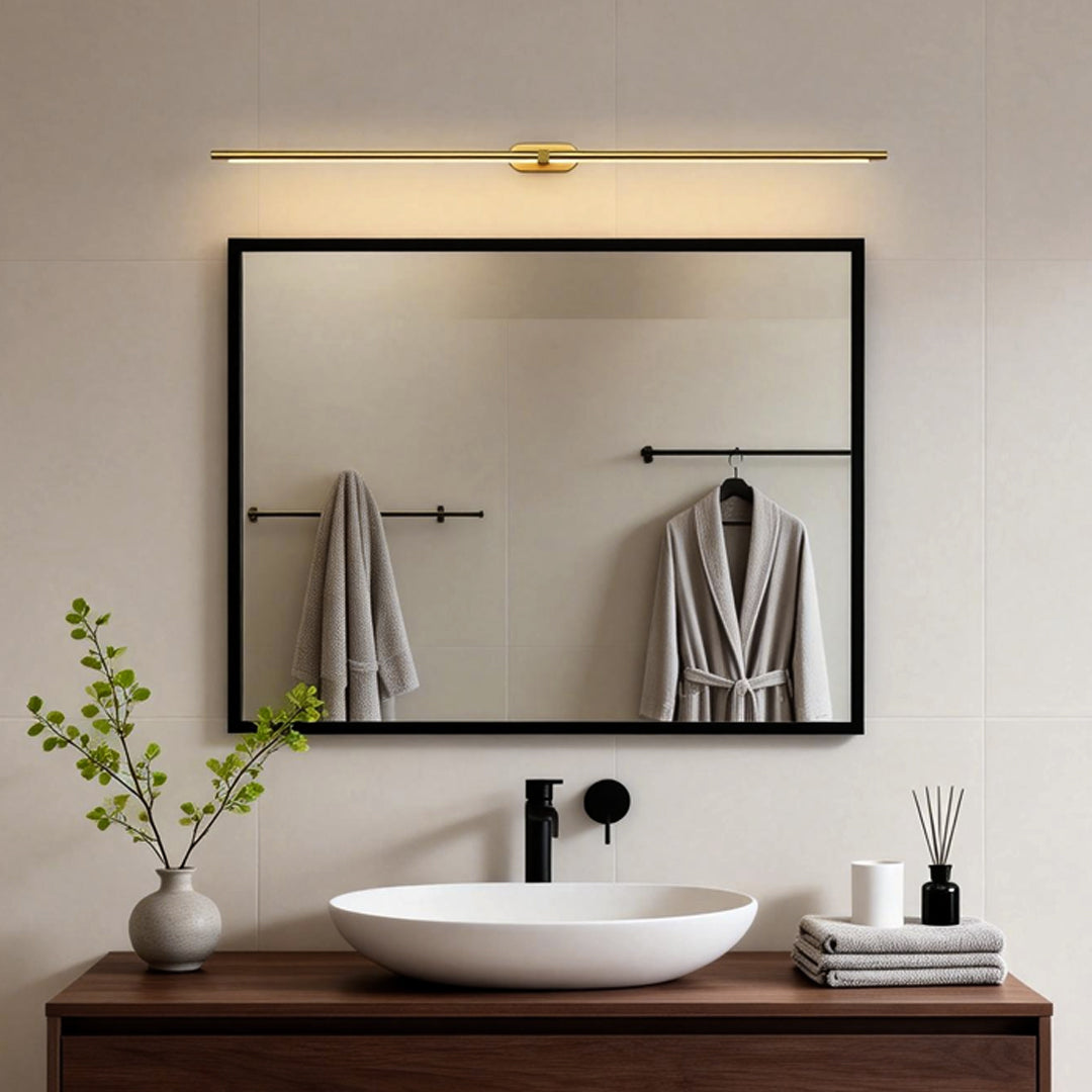 Contemporary bathroom vanity light strip in a refined gold finish, ideal for enhancing bathroom aesthetics.