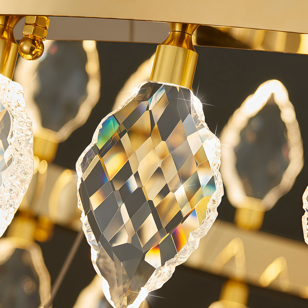 Detailed view of gold frame and crystal elements on Crystorama chandelier.