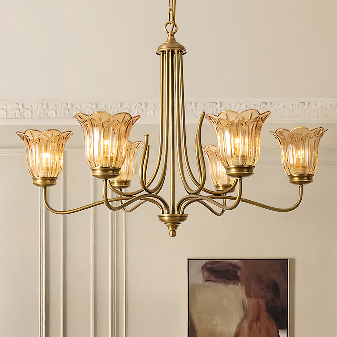 Gold glass chandelier in elegant interior with tall ceilings and sophisticated design elements