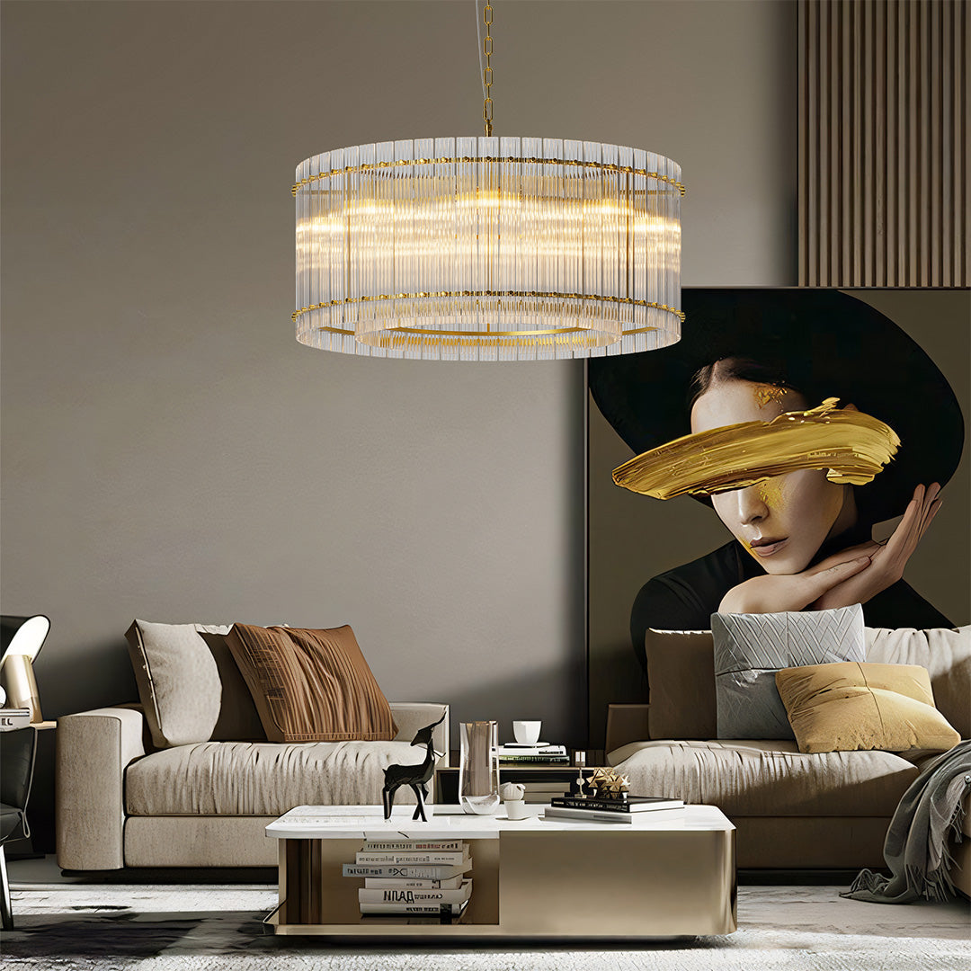 Round gold glass lamp shade chandelier brightening a cozy living room with warm ambient light.