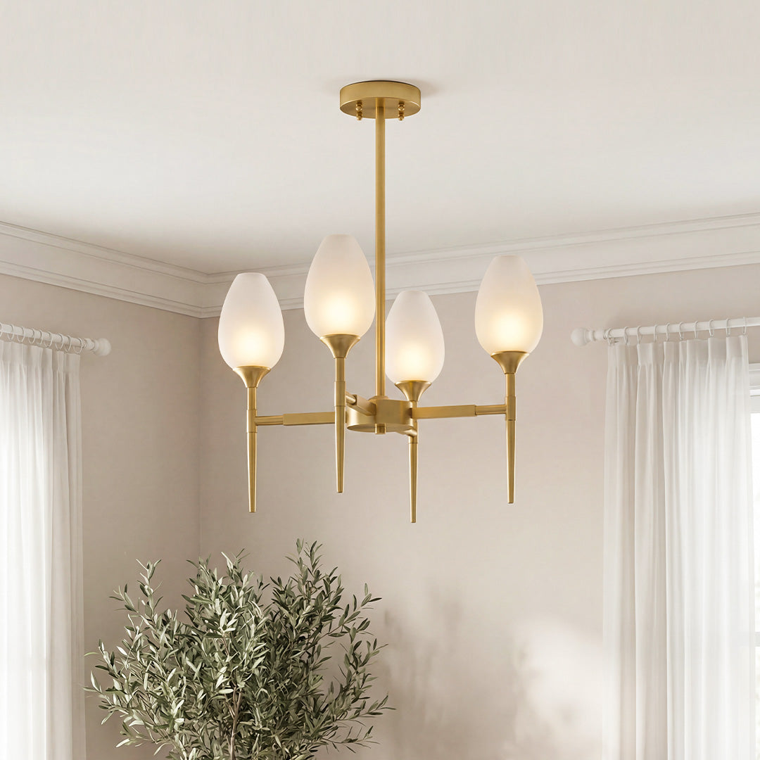 Elegant gold glass modern chandelier featuring frosted tulip-shaped shades and sleek tapered stems in a bright, contemporary room.