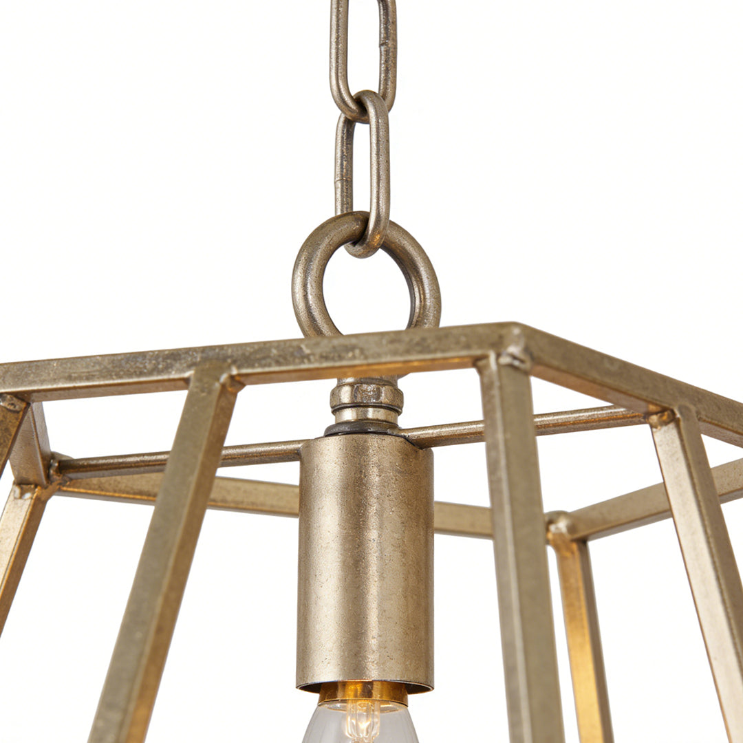 Top-down perspective of a gold hanging pendant light with elegant chain suspension and industrial design.