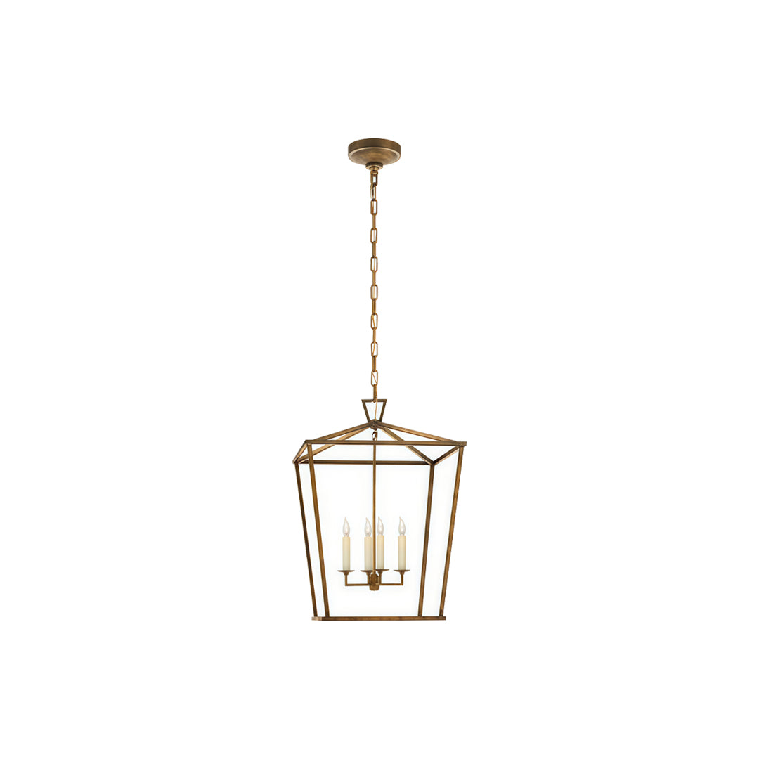 Gold lantern chandelier isolated on white background with classic brass finish.