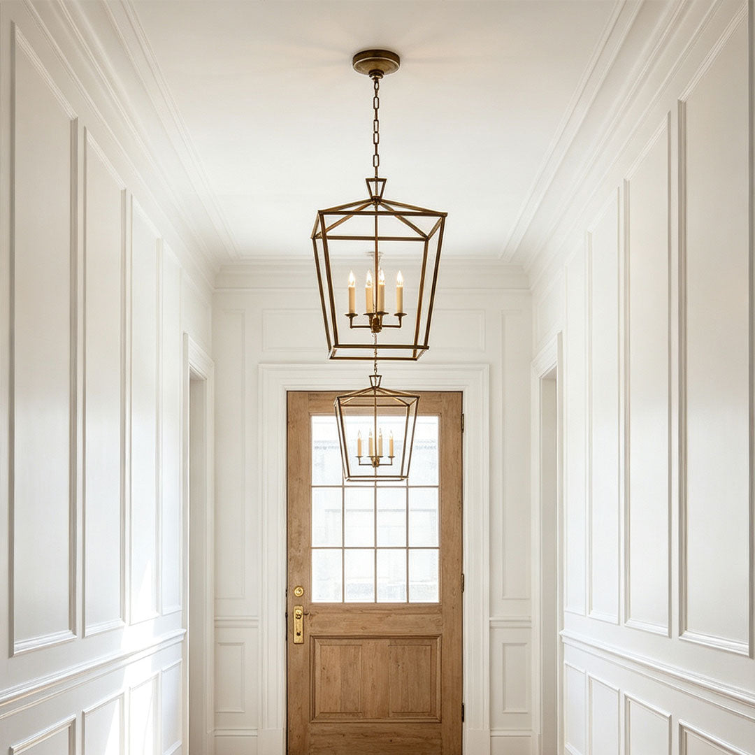 Gold lantern chandelier decorating a luxury corridor with elegant traditional interior style.