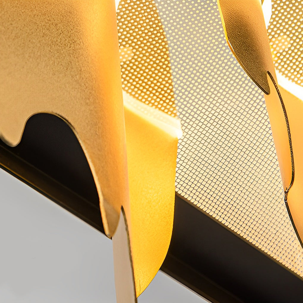 Gold leaf chandelier with a black finish, installed in a stylish living room.