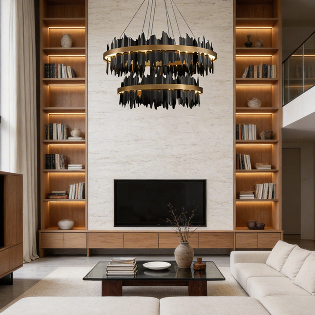 Gold leaf chandelier providing elegant illumination above a contemporary sofa.