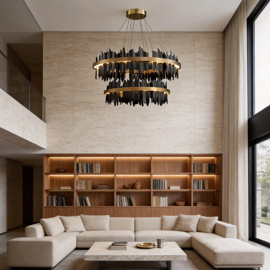 Gold leaf chandelier with a modern design, illuminating a luxurious living room.
