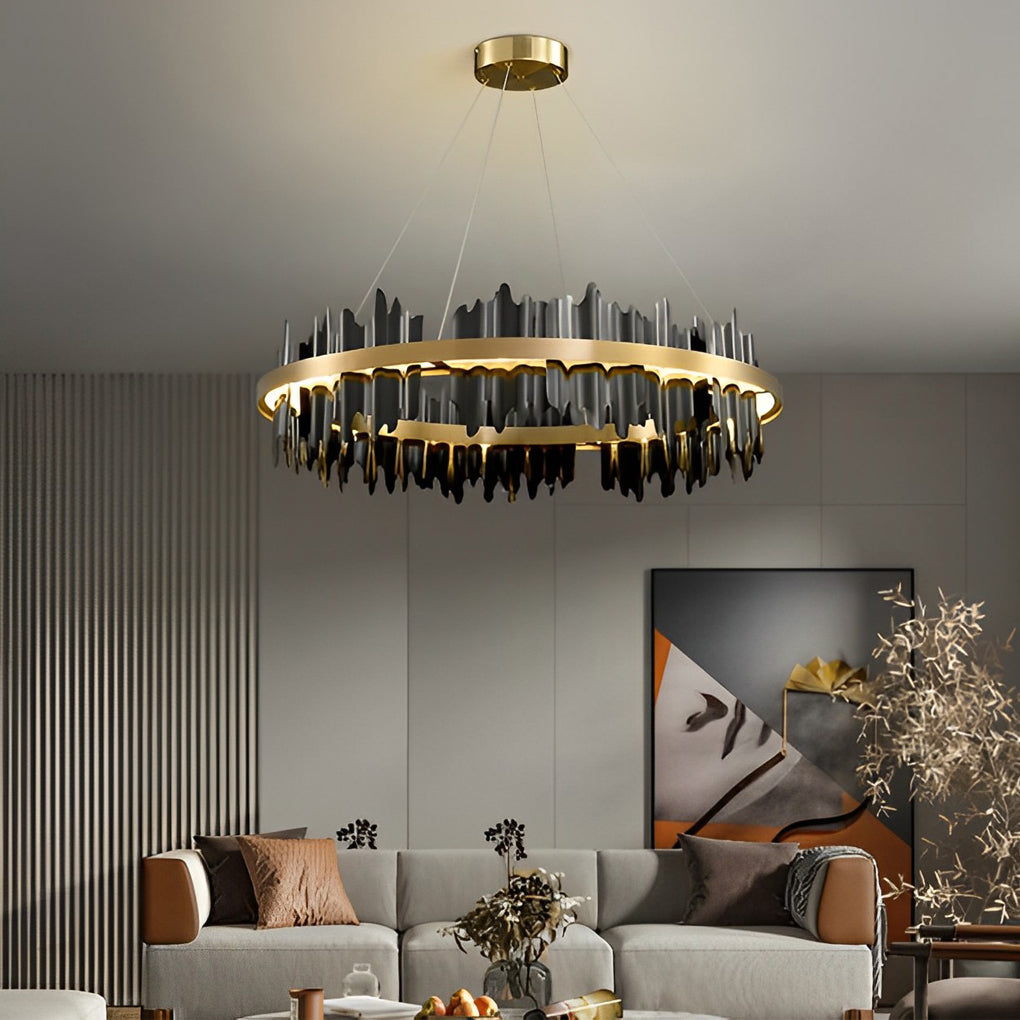 Gold leaf chandelier with a sleek black and gold finish, enhancing a stylish interior.