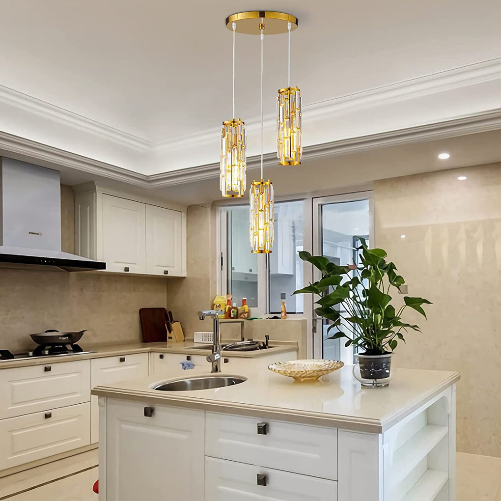 Gold mini crystal pendant lights hanging from a round ceiling canopy in a bright kitchen.