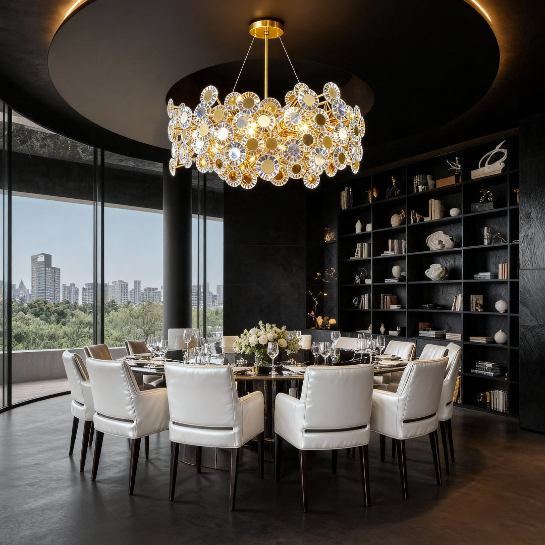 Gold modern chandelier illuminating formal dining room with marble table and city skyline views through floor-to-ceiling windows