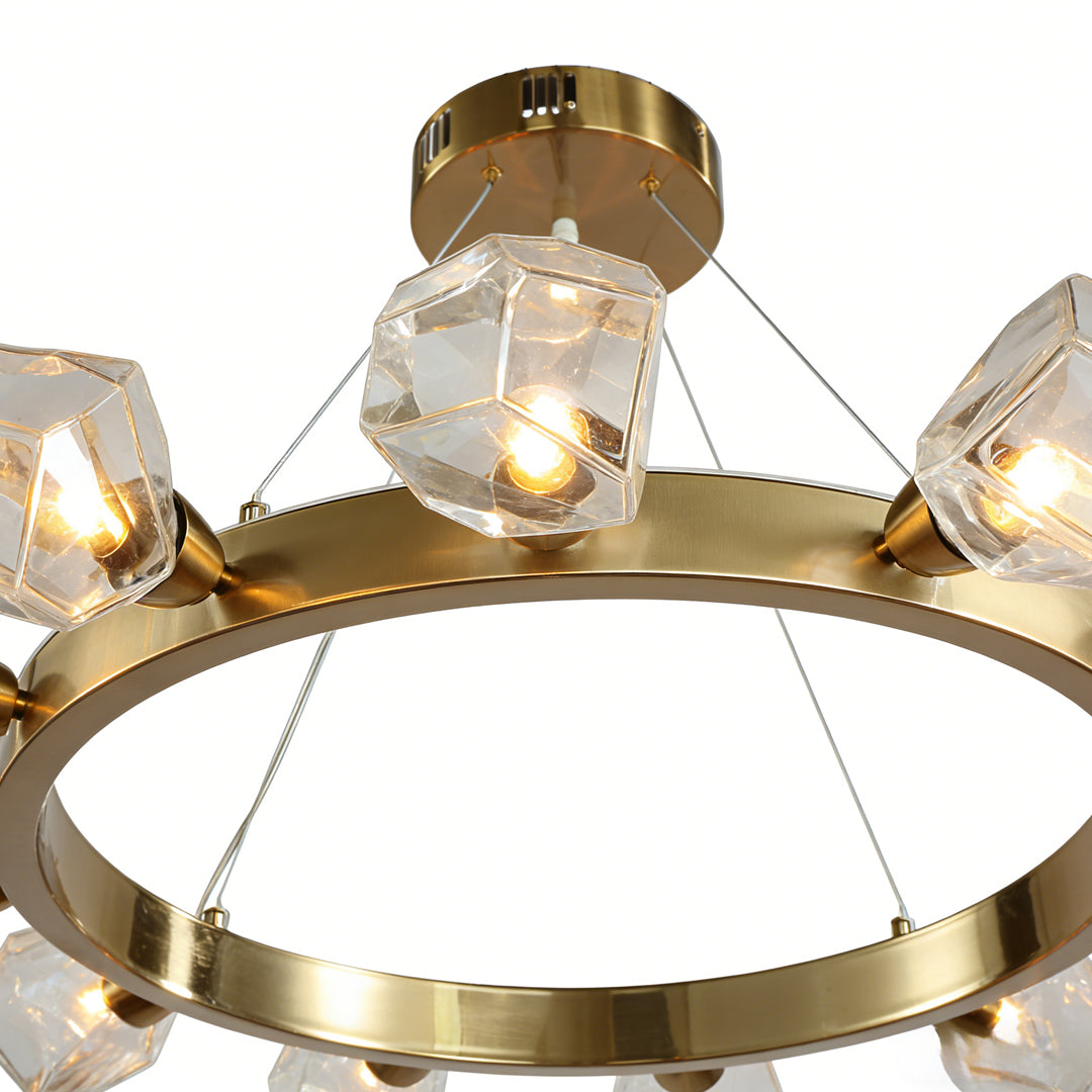 Elegant gold round chandelier featuring a circular frame and multiple hanging crystal light pendants.