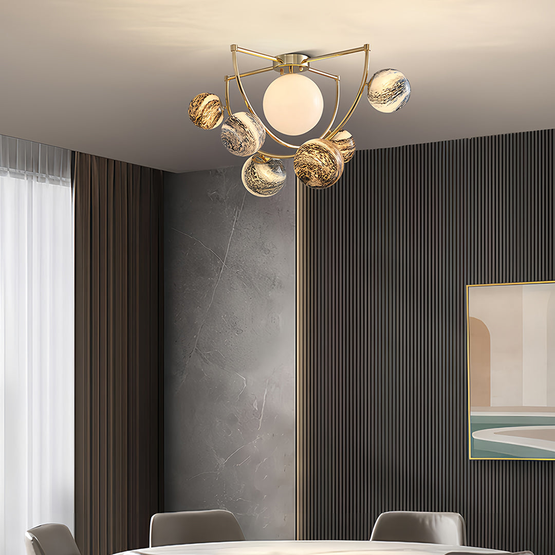 Gold semi flush ceiling light mounted in contemporary living space with dramatic striped ceiling design